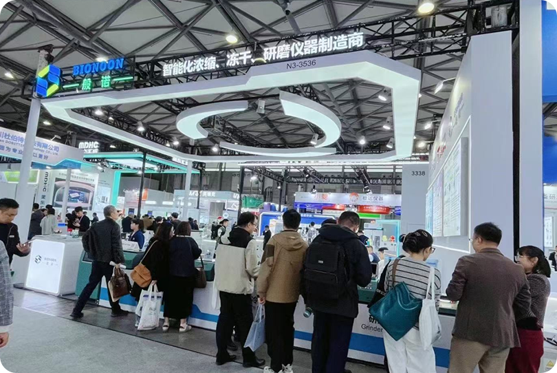 Stack of product boxes in a room with window background