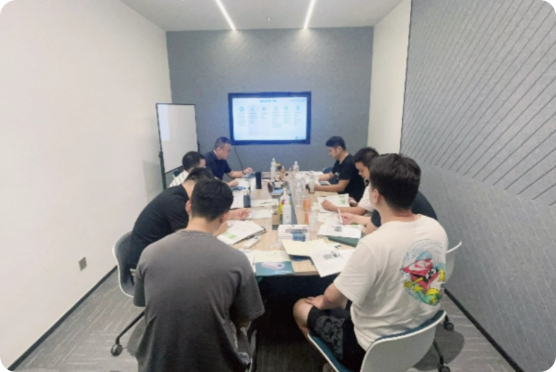 Stack of product boxes in a room with window background